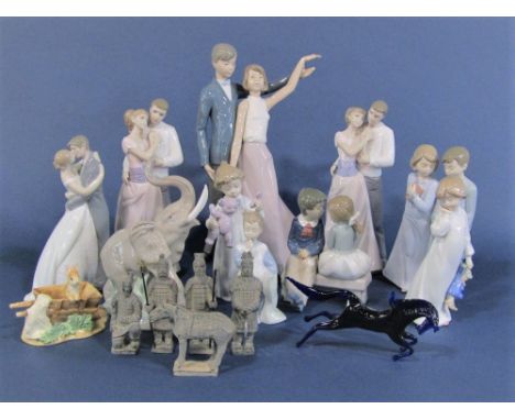 A collection of Nao figure groups of male and female couples, children, dancers, etc, together with a Nao elephant, a Border 