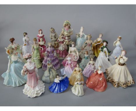 A collection of mainly Coalport figures of ladies including Nell Gwynn and Marie Antoinette from the Femmes Fatales series, t