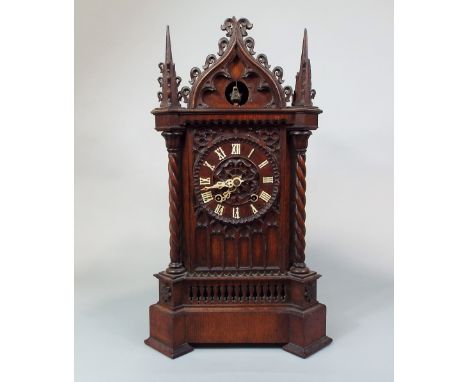 Impressive Black Forest double fusee, automaton, cuckoo mantel clock, in a Gothic architectural case, with applied bone Roman