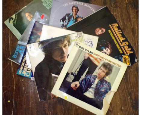 A quantity of vinyl LPS artists include Bob Dylan, Rolling Stones, Johnny Cash, etc (18)