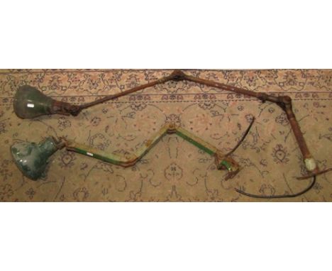 Two vintage industrial anglepoise lights, both with green enamel shades, wall mounted brackets, the longest capable of 136 cm