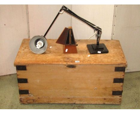 A 19th century stripped pine blanket box with steel re-enforced corner brackets, hinged lid and side carrying handles, togeth