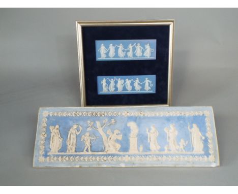 A pair of Wedgwood blue ground Jasperware plaques showing dancing classical female figures (in one frame) overall frame size 