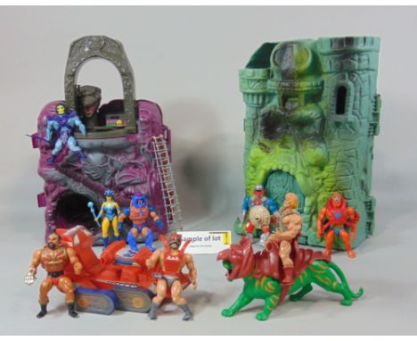 1980s Masters of the Universe toy collection including Snake Mountain and Castle Greyskull, with a bag of accessories and eig