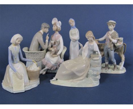 A Lladro figure group of male and female characters and a dog, seated on a love seat, together with a further Lladro figure o