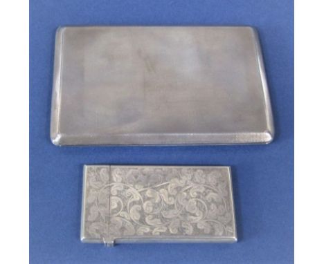 1930s engine turned silver cigarette case with slide opening action, maker C &amp; C, London 1934, 13cm long; together with a