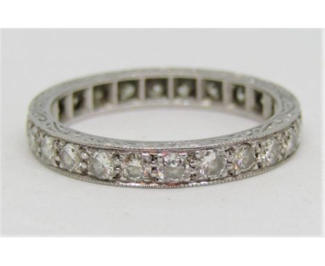 Diamond eternity ring with millegrain setting, in unmarked white metal, size L/M, 3.5g 