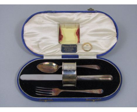 9ct wedding ring, size P/Q, 2.2g, together with a cased silver christening set inscribed 'Jan' comprising knife, fork, spoon 