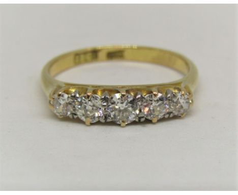 Good 18ct graduated five stone diamond ring, centre stone 0.15cts approx, size M/N, 3g