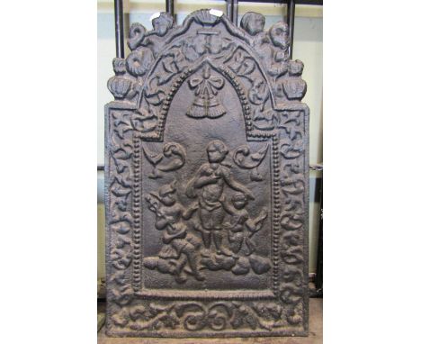A small 19th century cast iron fire back of stepped arched form with raised classical figures and scrolling foliate detail, 6