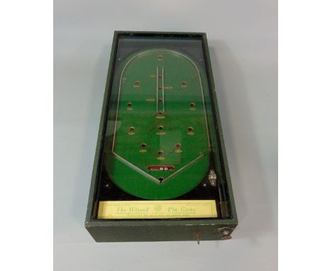 Vintage bagatelle type game 'The Wizard Pin game' in solid green case