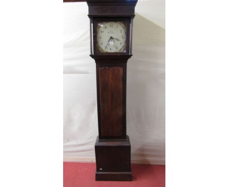 A Georgian oak longcase clock with simple column supports, the hood enclosing a 30cm square painted dial, with floral spandre