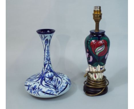 Contemporary Moorcroft bottle neck vase with early Macintyre pattern in blue, 25cm high, together with a further Moorcroft ce