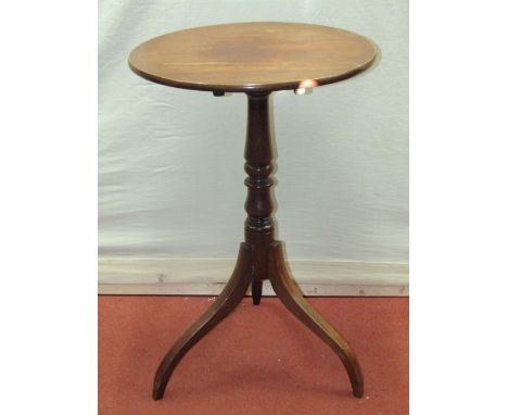 A small Georgian mahogany snap top table, the circular top 50cm diameter, raised on a turned pillar and tripod base