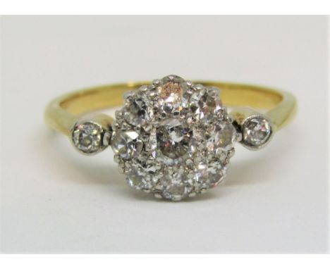 Attractive early 20th century 18ct diamond cluster ring, size J/K, 2g