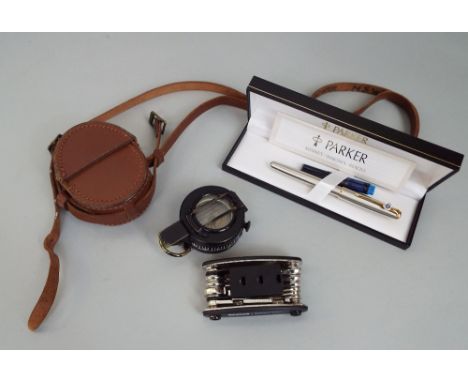 World War II military compass, T.G &amp; cO 294862, 1944 Mark III in leather pouch, Parker Sonnet fountain pen, unused and a 