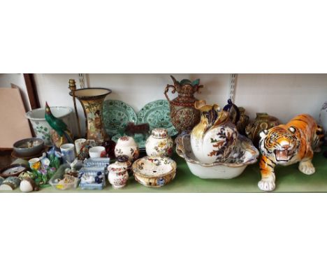A large ceramic model of a prowling tiger with naturalistic painted finish (af) 76cm long approx, together with further ceram