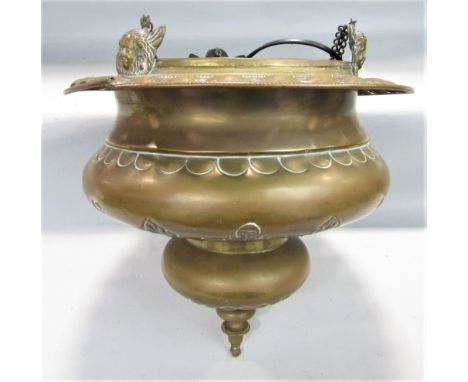 A hanging brass ceiling light with acanthus leaf detail and winged cherub mounts, with ceiling rose and chains