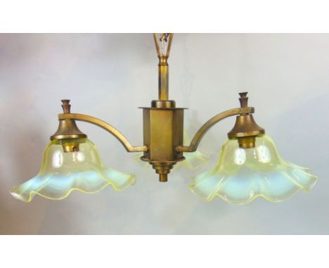 A good quality early 20th century brass three branch ceiling light fitted with vaseline glass shades, 50 cm diameter