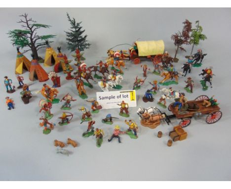 Collection of vintage model toys, mostly Britains, with a wild west theme including Herald series mounted figures, Indians, C