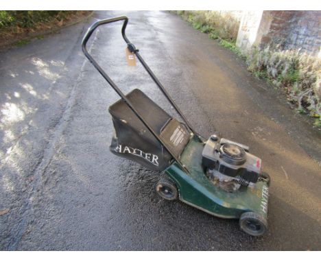 A Hayter Hunter 41 petrol driven self propelled rotary lawn mower and grass collection bag