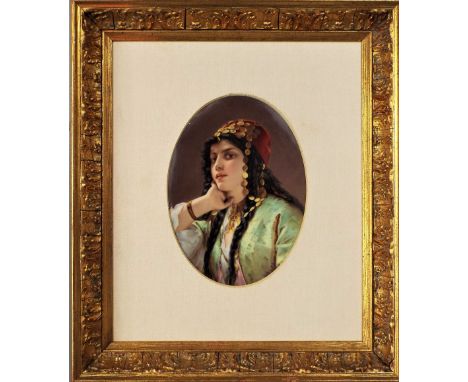 A 19th century continental ceramic plaque in the Berlin manner with bust length portrait of a young woman in Turkish style co