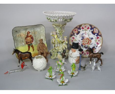 A late 19th century continental table centre with applied figures of boy musicians in 18th century style costume, together wi