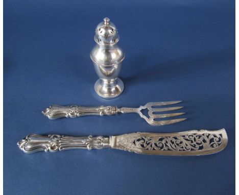 Good pair of Victorian silver fish serving cutlery comprising knife and fork, the knife with typical pierced blades upon embo