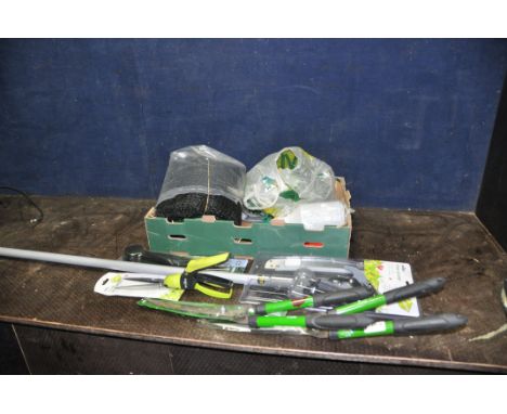 A TRAY CONTAINING GARDENING TOOLS including a Wilko tree pruner, Topiary shears, grass shears, Kingfisher hedge clipper etc