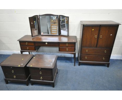 A STAG MINSTREL FOUR PIECE BEDROOM SUITE, comprising a dressing table, with a triple mirror and five drawers, width 153cm x d