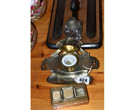 A VICTORIAN MAHOGANY AND EBONISED DESK STAND, with two pen trays and two cuboid glass inkwells with a central handle, togethe