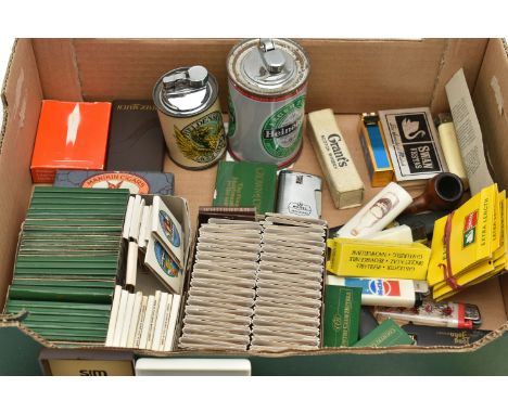 A BOX OF SMOKING ITEMS, to include a boxed 'Ronson Varaflame' lighter, a boxed 'Silver Match' lighter, a boxed 'Ronson Comet 