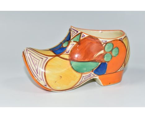 A CLARICE CLIFF SABOT/CLOG, in Melon pattern painted with an abstract fruit design, with 'hand painted, Fantasque by Clarice 