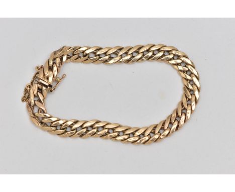 A 9CT GOLD CURB LINK BRACELET, hollow links, fitted with a push piece, integrated clasp, with figure of eight safety clasp an
