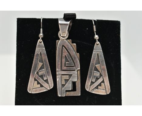 A PAIR OF WHITE METAL EARRINGS AND MATCHING PENDANT, abstract drop earrings, one stamped 'Sterling' signed Peter Nelson, fitt