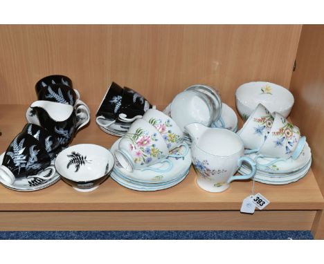 A GROUP OF SHELLEY 'WILD FLOWERS' AND ROYAL ALBERT 'NIGHT AND DAY' TEA WARES, comprising twenty pieces of Shelley: a cream ju