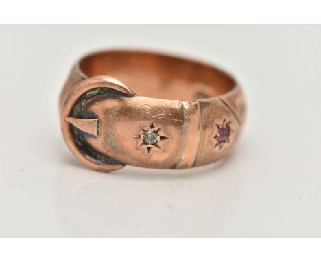 AN EARLY 20TH CENTURY 9CT ROSE GOLD BELT BUCKLE RING, wide band approximate band width 9.5mm, star set with a small ruby and 