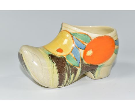 A CLARICE CLIFF SABOT/CLOG, in Citrus Delicia pattern painted with oranges on a dribbled green and brown ground, with 'hand p