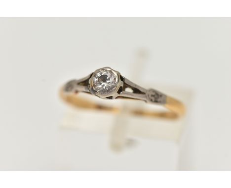 A YELLOW AND WHITE METAL SINGLE STONE DIAMOND RING, round brilliant cut diamond, collet set in a white metal mount, estimated