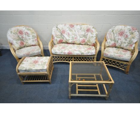 A RATTAN FIVE PIECE CONSERVATORY SUITE, comprising a two seater sofa, width 123cm x depth 83cm x height 85cm, two armchairs, 