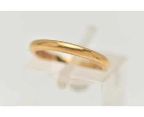 A YELLOW METAL POLISHED BAND RING, band width 2.2mm, unmarked, makers mark 'J.P.T', ring size G, approximate gross weight 2.9