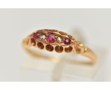 AN EARLY 20TH CENTURY RUBY AND DIAMOND BOAT RING, set with three small circular cut rubies, interspaced with two rose cut dia