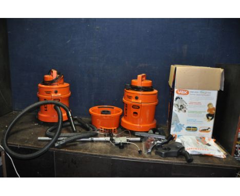 TWO VAX 6131 WET AND DRY VACUUM CLEANERS with two dry vacuums, two flexi hoses, one metal tube, one wet filters, one set of w