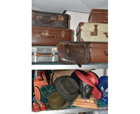 A COLLECTION OF VINTAGE SUITCASES, TRUNKS, BAGS AND HATS, comprising a navy blue and white Revelation travelling trunk, a lar