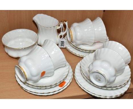 A TWENTY PIECE ROYAL ALBERT 'VAL D'OR' PATTERN, comprising a cream jug, a sugar bowl, and six each of teacups, saucers and te