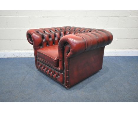 AN OXBLOOD LEATHER CHESTERFIELD CLUB CHAIR, width 107cm x depth 90cm x height 67cm (condition report: some cracking, but no t