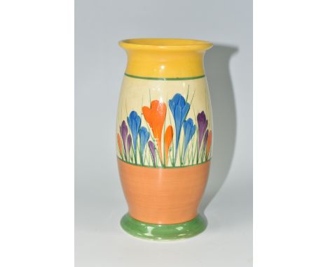 A CLARICE CLIFF 'CROCUS' PATTERN VASE, the footed vase painted with orange, purple and blue crocuses, bearing 'Crocus, hand p