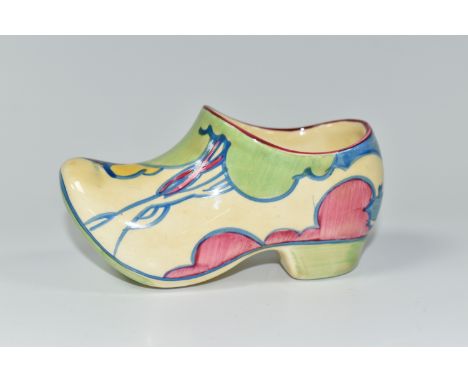 A CLARICE CLIFF SMALL SABOT/CLOG, in Pastel Autumn pattern, painted with pastel coloured trees and a house in a landscape, wi