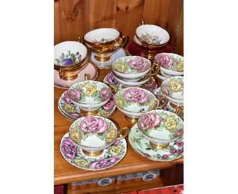 A SET OF EIGHT TAYLOR &amp; KENT FLORAL TEA CUPS AND NINE SAUCERS, pale green ground decorated with pink roses 6787A, togethe