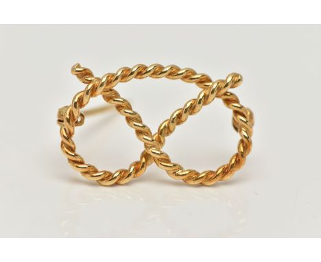 AN 18CT GOLD STAFFORDSHIRE KNOT BROOCH, rope twist knot, approximate width 28.0mm, fitted with a brooch pin and safety clasp,